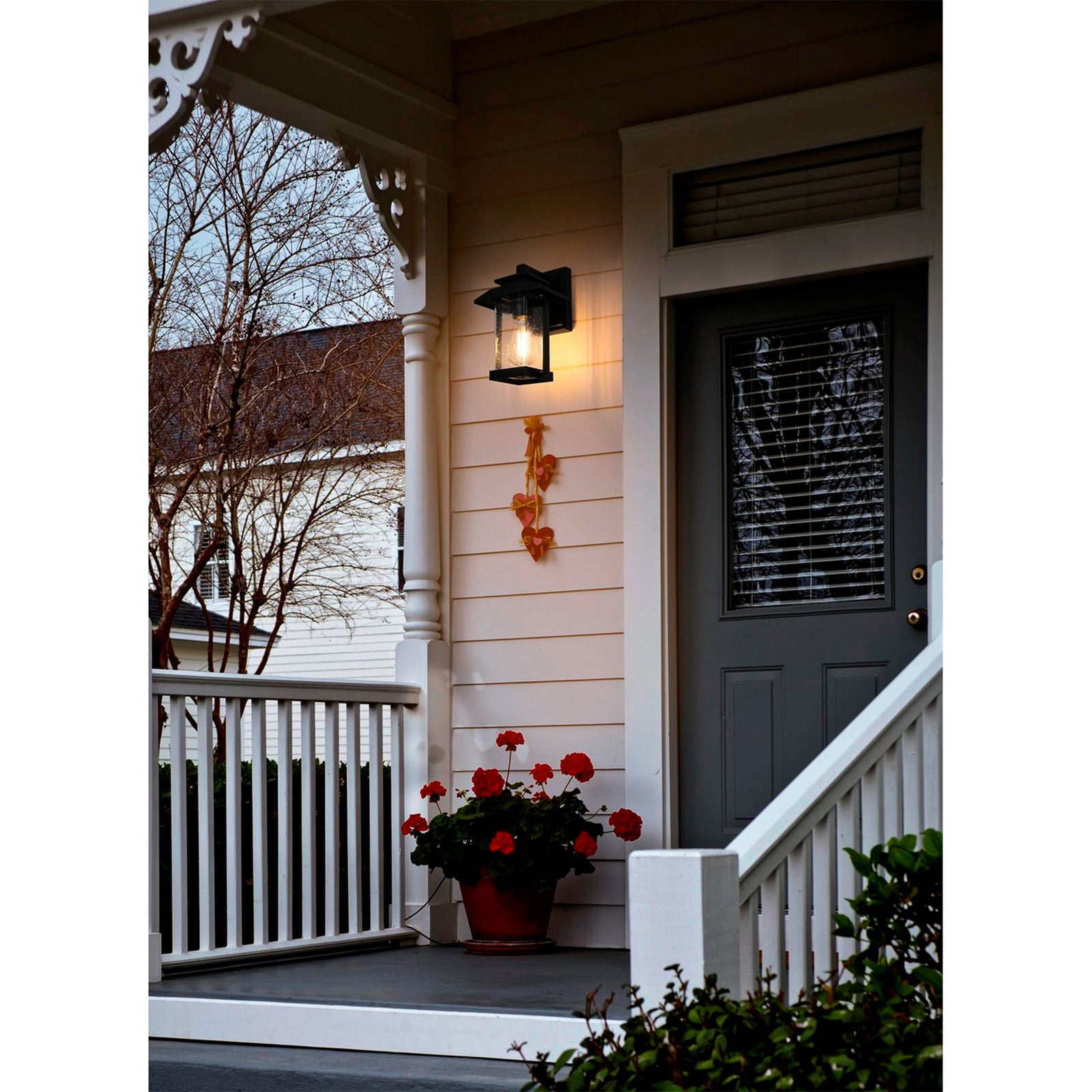 7 Inch Outdoor Wall Sconce in Black - View 2 - Joshua Marshal