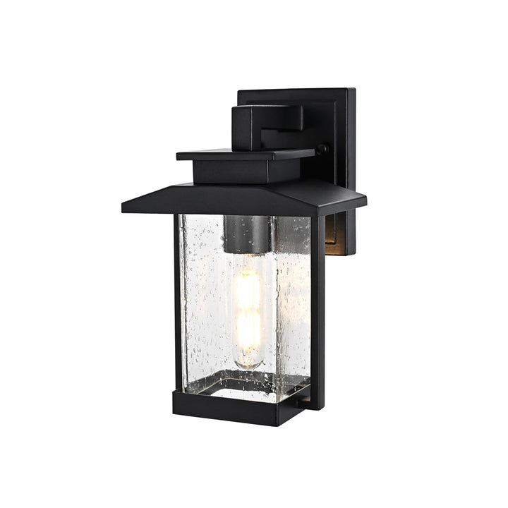 7 Inch Outdoor Wall Sconce in Black - View 4 - Joshua Marshal