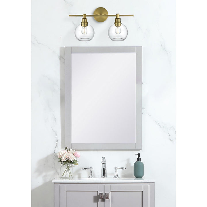 2 Light Satin Gold And Clear Glass Wall Sconce - View 2 - Joshua Marshal