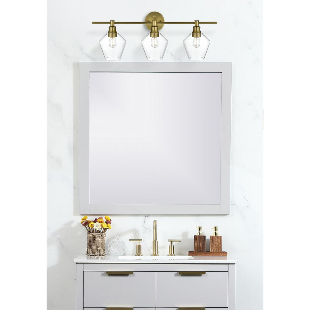 3 Light Satin Gold And Clear Glass Wall Sconce - View 2 - Joshua Marshal