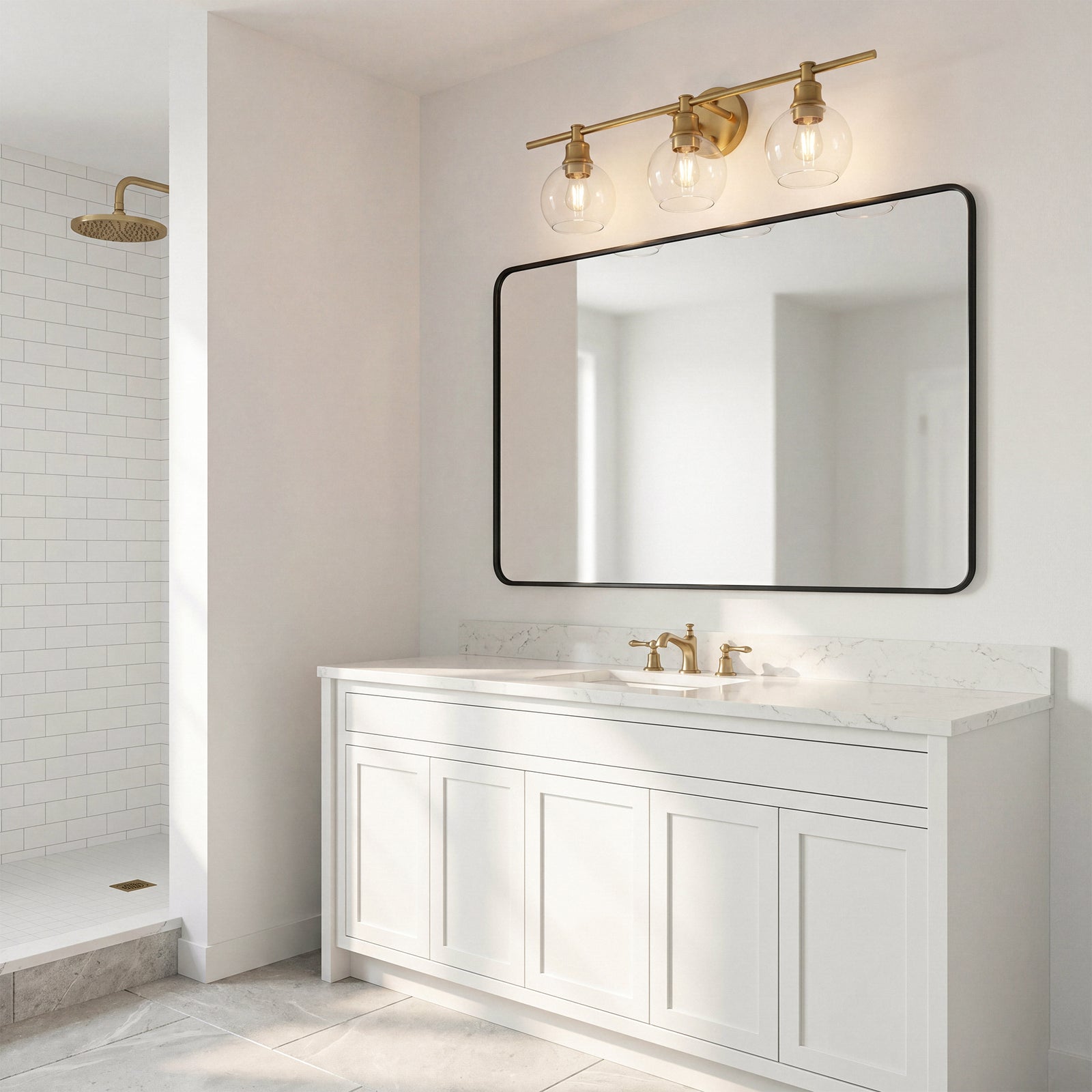 3 Light Satin Gold And Clear Glass Wall Sconce - View 2 - Joshua Marshal