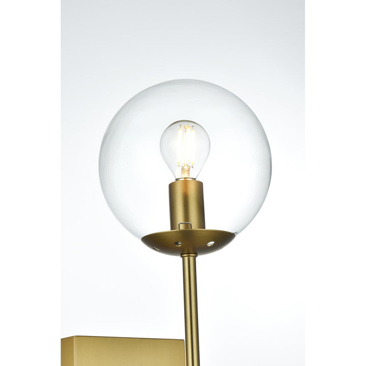 6 Inch Wall Sconce Clear Shade In Satin Gold - View 5 - Joshua Marshal